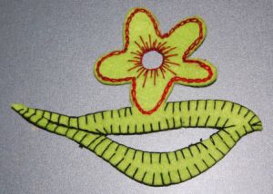 Pyntedug af filt genbrugt til bogmærker og andet med fint broderi.