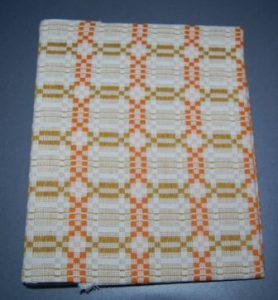 Retrodug genbrugt til bogomslag.