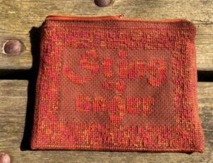 Kit med korsstingsbroderi, Sting og sager.