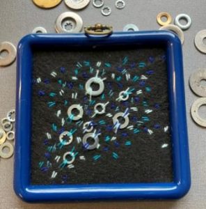 Broderi kit. Spændeskiver på filt.