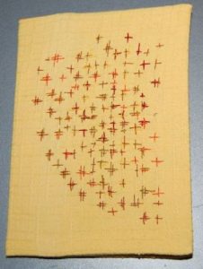 Vejledning til bogomslag med frit broderi i Håndværk og design.